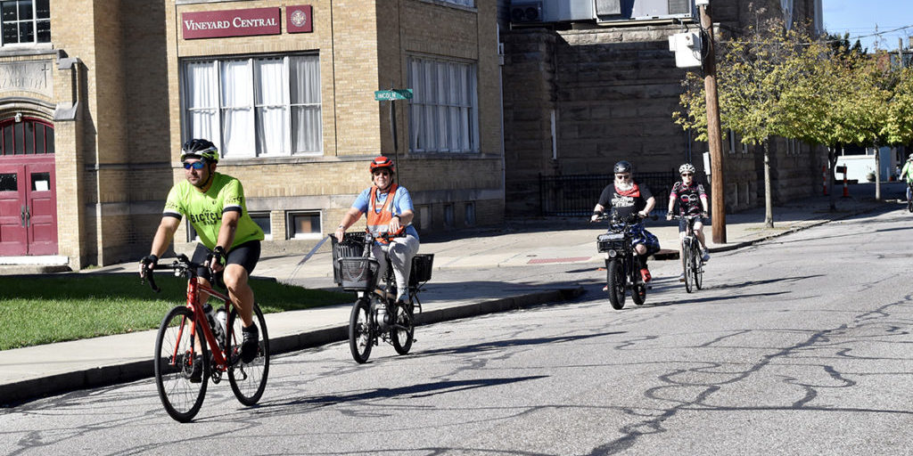 A group of cyclists learning about low-stress streets. 